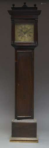 An oak longcase clock by Joseph Mew, Blandford, early 19th Century, the hood with glazed aperture