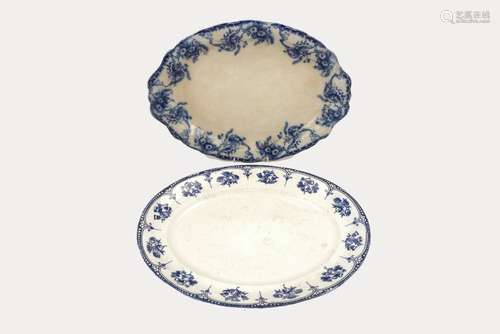 Four large Staffordshire oval shaped meat platters with various blue and white printed patterns of