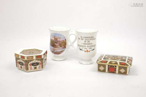 Two Royal Crown Derby porcelain boxes and two commemorative mug80