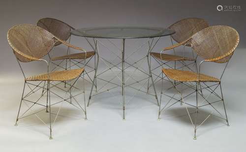 A wirework and caned garden table and four chairs, late 20th century, the circular table with