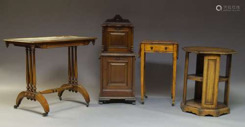 An Edwardian mahogany coal purdonium, with carved shelf motif to top rail above cupboard with fall