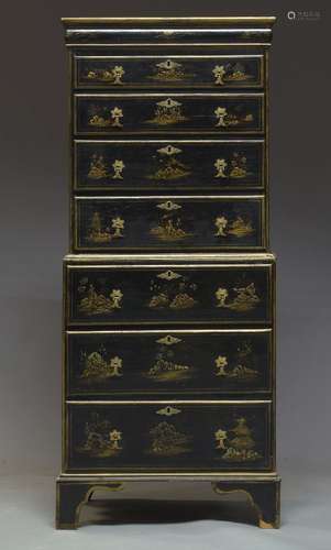 A Chinoiserie black lacquered chest on chest, late 19th, early 20th Century, overall decorated