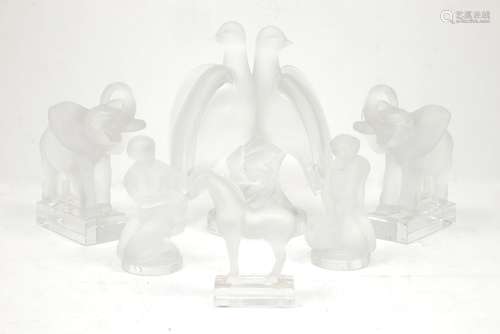 Modern Lalique, a pair of elephant bookends; two love birds, a small horse, two female figures - one