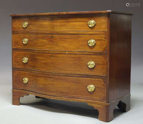 A Regency mahogany and line inlaid serpentine chest, with four long graduated drawers, raised on