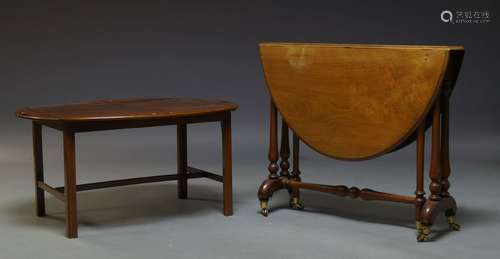 A George III style mahogany butler's tray, 20th Century, the oval top with four hinged gallery