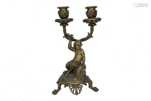 A French bronze twin branch candelabra, late 19th/early 20th century, modelled with a figure of a