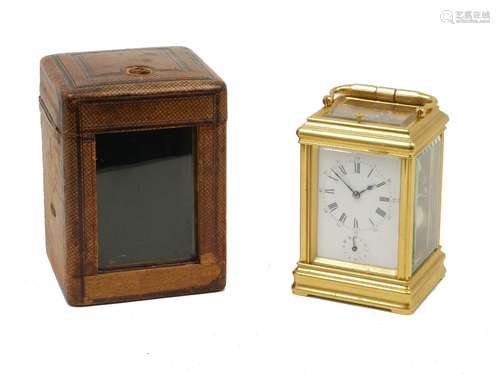 A Victorian repeating brass carriage clock, Moroccan leather cased striking with a top repeater