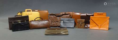 An Edwardian leather Gladstone bag, together with an Icartai orange clutch portfolio with matching