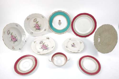 A Royal Copenhagen porcelain part dinner service, the rims moulded with basket weave designs,