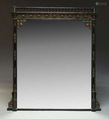 A large Aesthetic movement ebonised and parcel gilt overmantle mirror, of rectangular form, the