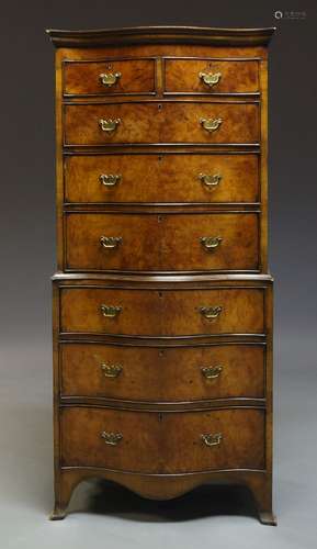 A George III style serpentine burr walnut and mahogany chest on chest, early 20th Century, the