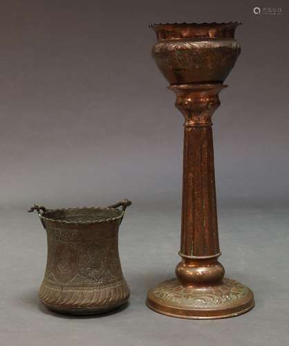 An Indian copper bucket, 20th century, mounted and engraved with panels of Indian gentlemen and deer