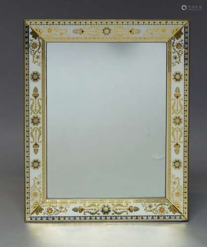 A Continental verre eglomise and brass bound wall mirror, second half 20th Century, of rectangular