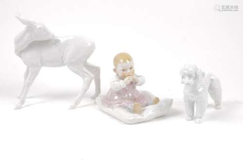 Meissen's child sitting on a pillow: Height 14 cm together with: Meissen's pooddle 15 cm x15 cm