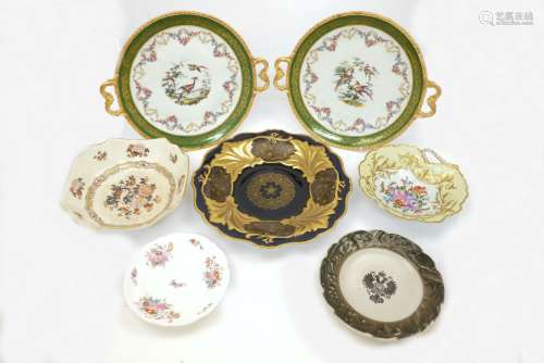 A French porcelain gilt mounted Limoges tazza, together with a similar gilt metal mounted dish and a