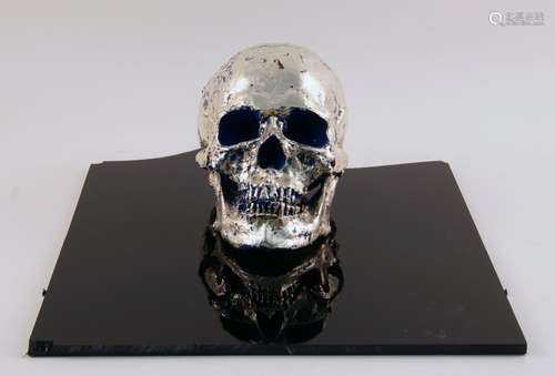 Philippe Pasqua, French b.1965- Vanite aux papillions; resin skull, minus butterflies, silver leaf