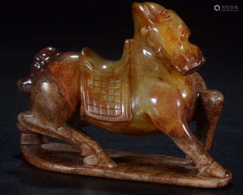 AN ANTIQUE JADE HORSE SHAPED PENDANT