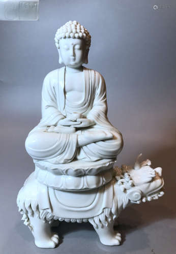 A DEHUA WHITE GLAZE SAKYAMUNI BUDDHA STATUE