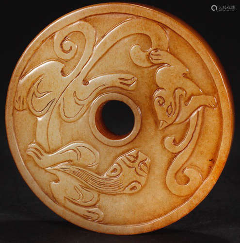 A HETIAN JADE CARVED DRAGON PATTERN BI