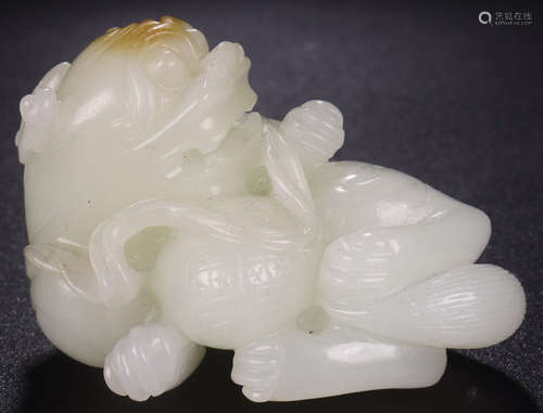 A HETIAN JADE CARVED LION SHAPE PENDANT