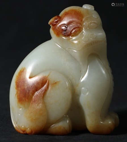 A HETIAN JADE CARVED BEAST SHAPED PENDANT