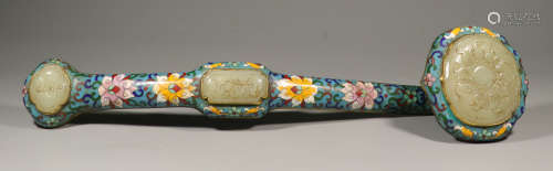 A CLOISONNE RUYI CARVED WITH AUSPICIOUS AND LONGEVOUS FLOWER PATTERN