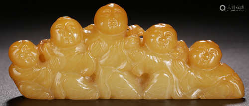 A HETIAN JADE CARVED FIGURE SHAPED PENDANT