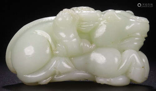 A HETIAN JADE CARVED CHILD&BULL SHAPE PENDANT