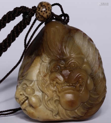 A HETIAN JADE CARVED PENDANT WITH BEAST PATTERN