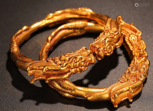 PAIR OF GILT BRONZE CAST BANGLE