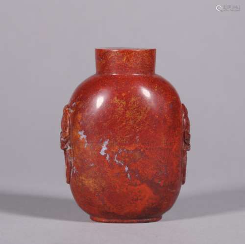 A CHINESE VINTAGE RED AGATE SNUFF BOTTLE