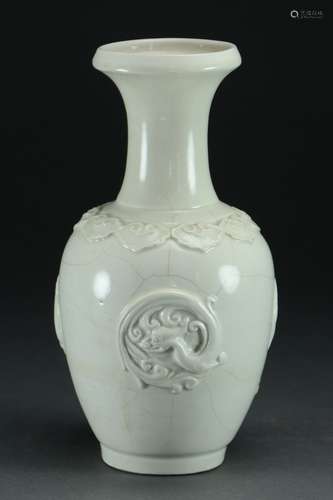 A WHITE GLAZED PORCELAIN MOLDED VASE, KANGXI PERIOD