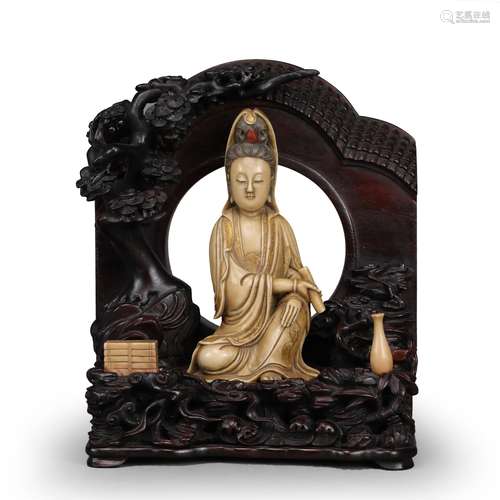 CARVED SOAPSTONE FIGURE OF GUANYIN WITH HARDWOOD BASE