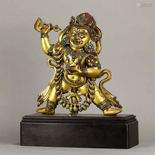 TURQUOISE-INLAID GILT BRONZE FIGURE OF MAHAKALA