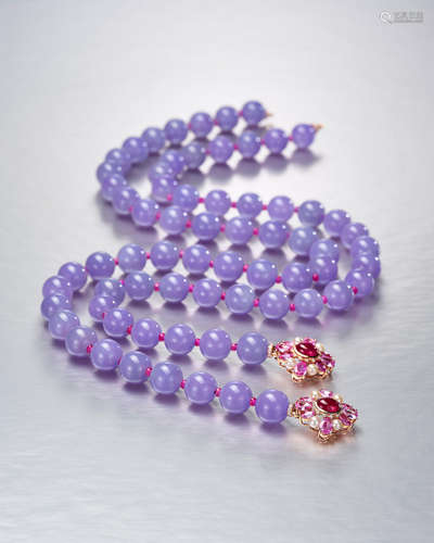 An Exceptional Strand Lavender Jadeite Bead Necklace