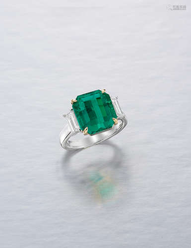 A Fine Emerald and Diamond Ring