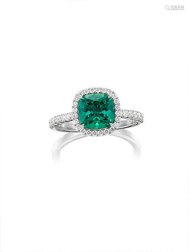 An Emerald and Diamond Ring