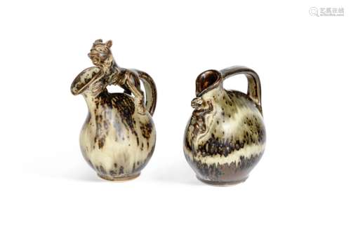 Bode Willumsen (Danish, 1895-1987) for Royal Copenhagen Two Stoneware Figural Jugs, circa 1930