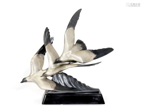 Alexandre Kelety (Hungarian, 1874–1940) 'In Flight': An Art Deco Patinated and Parcel Silver Bron...