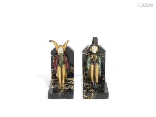 Roland Paris (German, 1894-1945) 'Wisdom and Poetry': A Pair of Art Deco Bronze and Ivory Bookend...