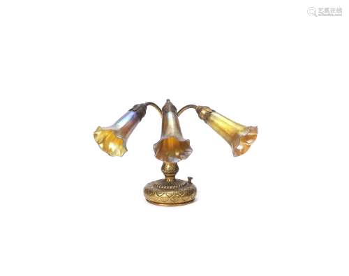 Tiffany Studios A Three-Light Lily Piano Lamp, circa 1910