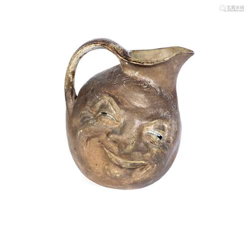 The Martin Brothers (British) A Double-Sided Stoneware Face Jug, executed 1897