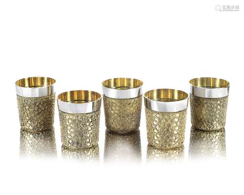 STUART DEVLIN: a set of five silver and silver-gilt beakers London 1978 (5)