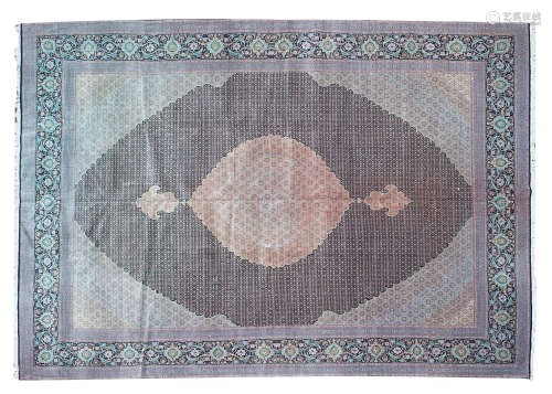 A Tabriz carpet 336 x 496cm