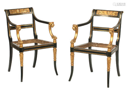 A set of four 19th century ebonised and parcel gilt open armchairs, After a design by George Smith