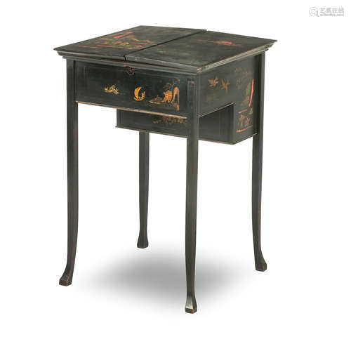 An early 20th century black lacquered writing table