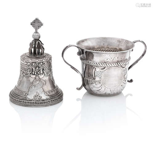 A late Victorian silver table bell and a modern Britannia standard porringer a the bell by William Comyns, London 1898, (3)