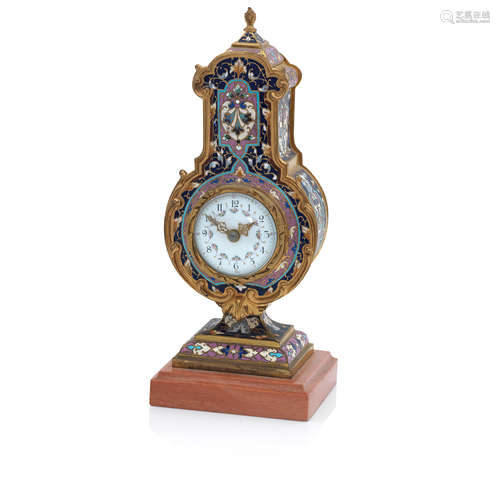 A late 19th/early 20th century champlevé enamel time piece