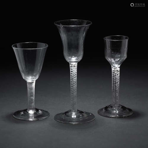 Two mixed twist wine glasses and an incised twist wine glass 18th Century