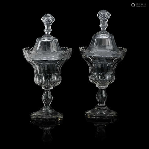 A pair of large cut glass sweetmeat dishes and covers 19th century